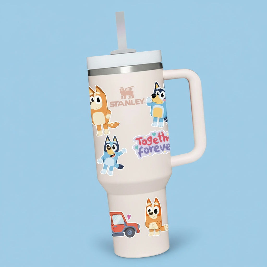 Stanley tumbler with cartoon characters and 'Bluey' branding on a colorful background