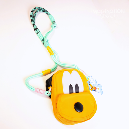 Pluto shaped Disney dog crossbody bag front view showing face and ears