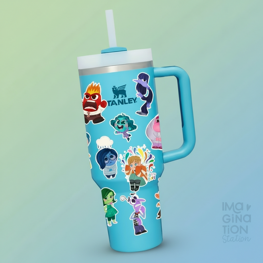 Blue tumbler with character designs from 'Inside Out' against a blurred background