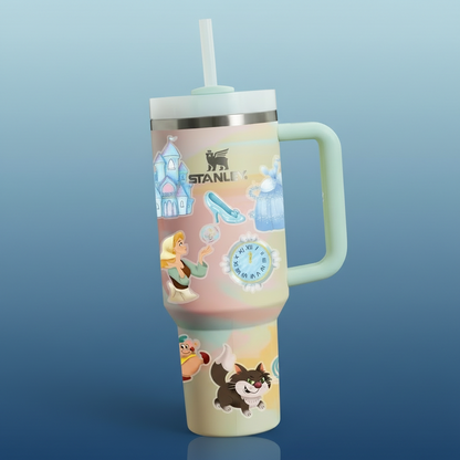Stanley tumbler with Cinderella design against a blurred fairy tale background
