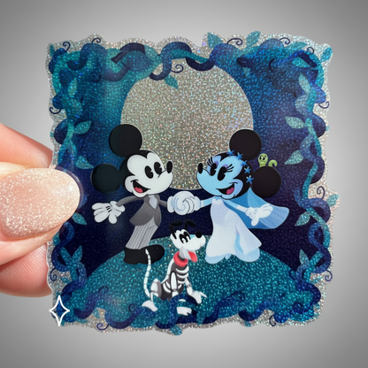 Glittery decorative item with cartoon characters on a plain background