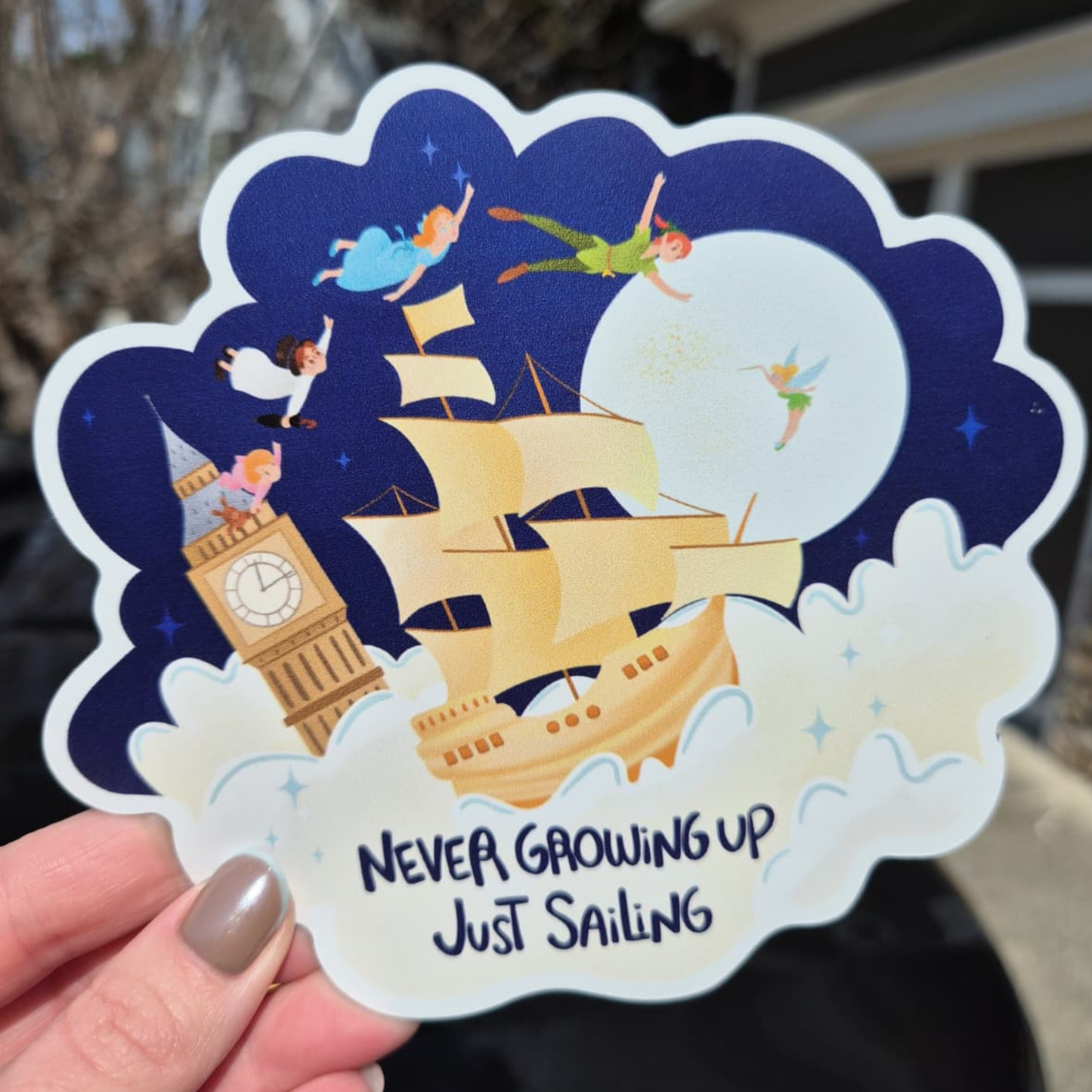A simulation showing a white cruise ship stateroom cabin door with a central brass-rimmed porthole, decorated with five applied custom Disney-themed magnets including designs of Ariel, Peter Pan, a beach scene, and other adventure quotes. A mockup of how they look in situ.