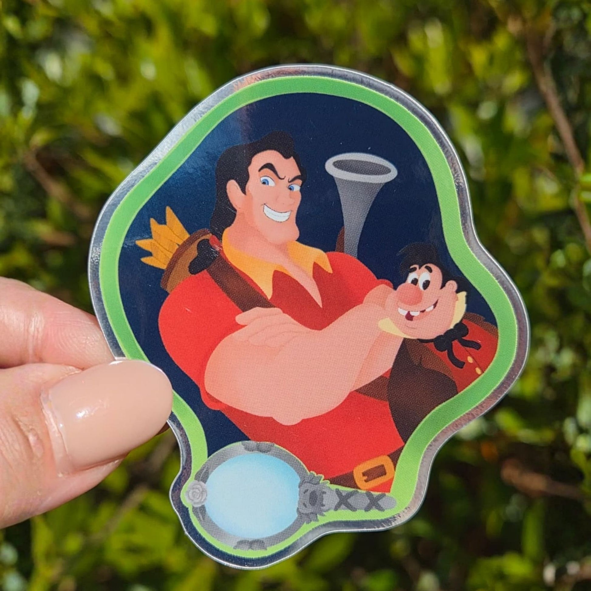 Gaston Beauty Beast sticker held by hand – mirror glossy Disney villain waterproof vinyl