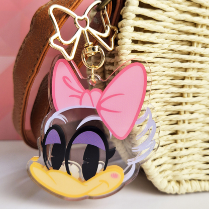 Daisy Duck shaker keychain rose gold bow clip detail close up