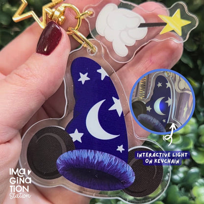 Sorcerer's Hat keychain glowing – light up feature activated showing Disney Fantasia inspired charm