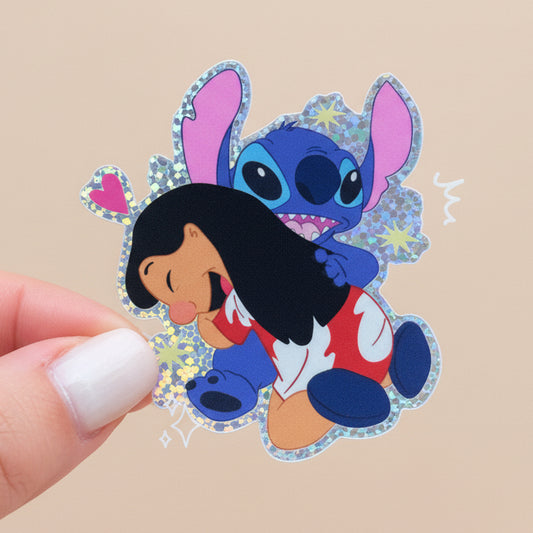 Cartoon character sticker of a girl and a blue creature with colorful design on grass background