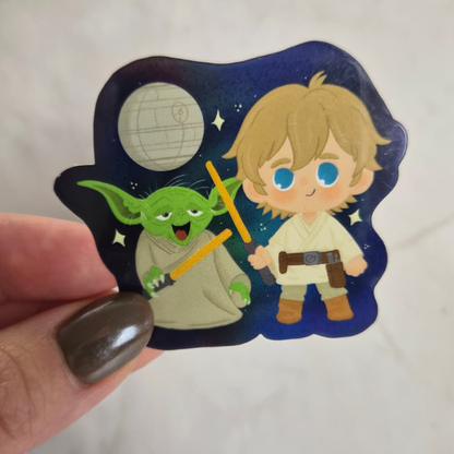 Cartoon character holding a lightsaber with a stylized depiction of Yoda and a young Jedi, set against a dark blue background with stars.