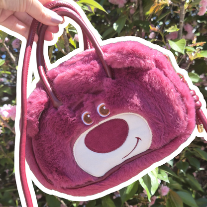 Lotso Bear crossbody bag lifestyle shot – Toy Story Disney Pixar character purse worn as crossbody