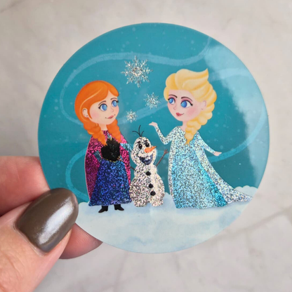 Frozen Anna Elsa pixie dust sticker held by hand – waterproof Disney princess vinyl decal