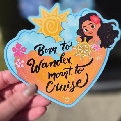 A close-up photograph of a hand holding a single, complex die-cut magnet inspired by Moana and a conch shell. It features a cartoon Moana figure, a ship's wheel, and stylized waves with the integrated, legible text: "BORN to WANDER, meant to Cruise." A perfect custom accessory for a Disney cruise stateroom door.