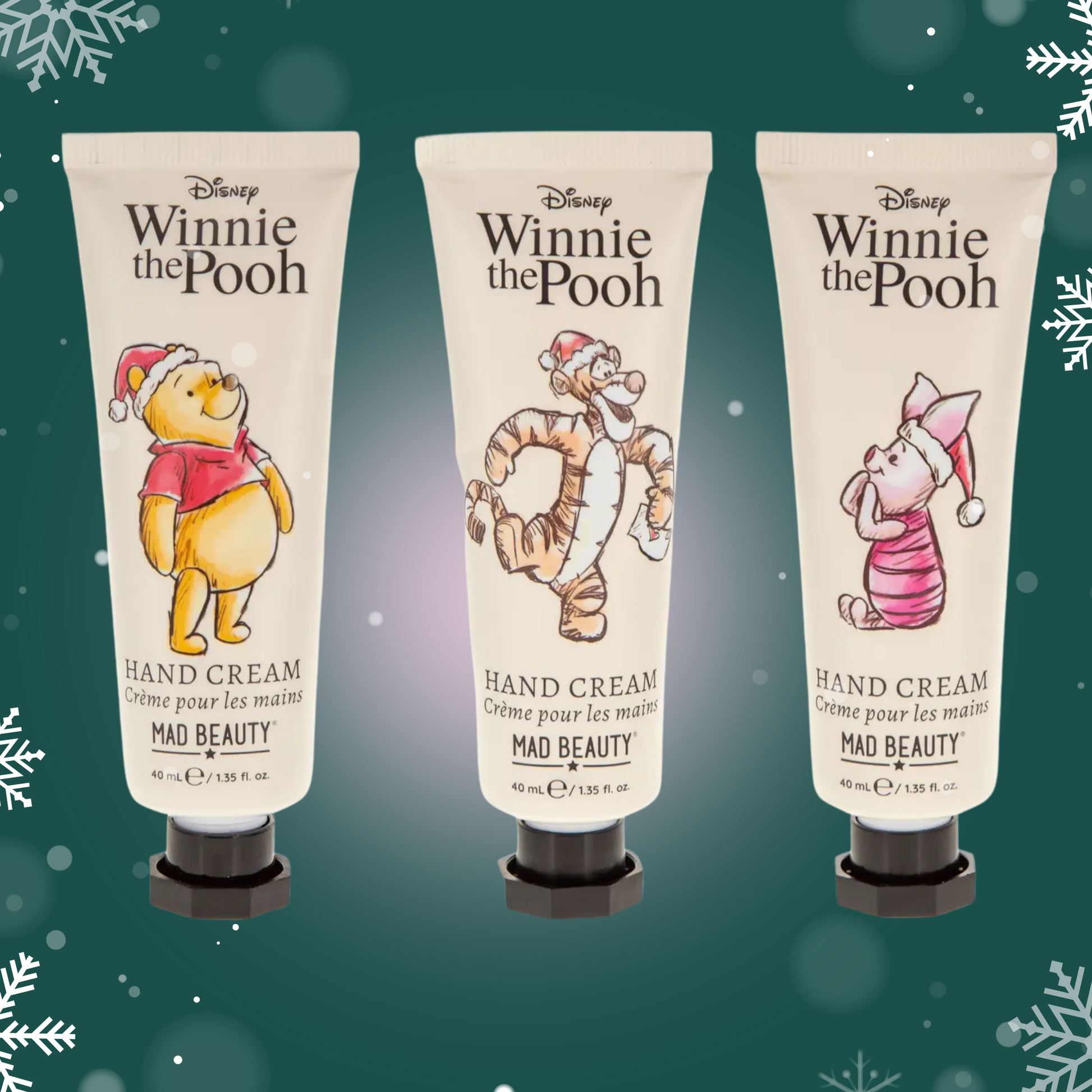 Three tubes of Winnie the Pooh hand cream on a green background with snowflake decorations.