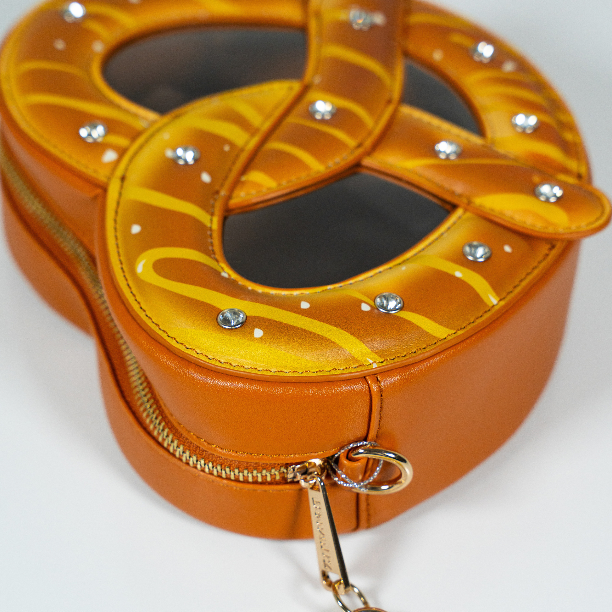 Pretzel food purse overhead view showing crystal stud embellishments