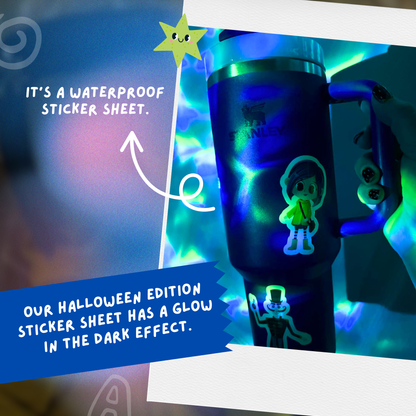 Tumbler with Halloween-themed stickers on a dark background