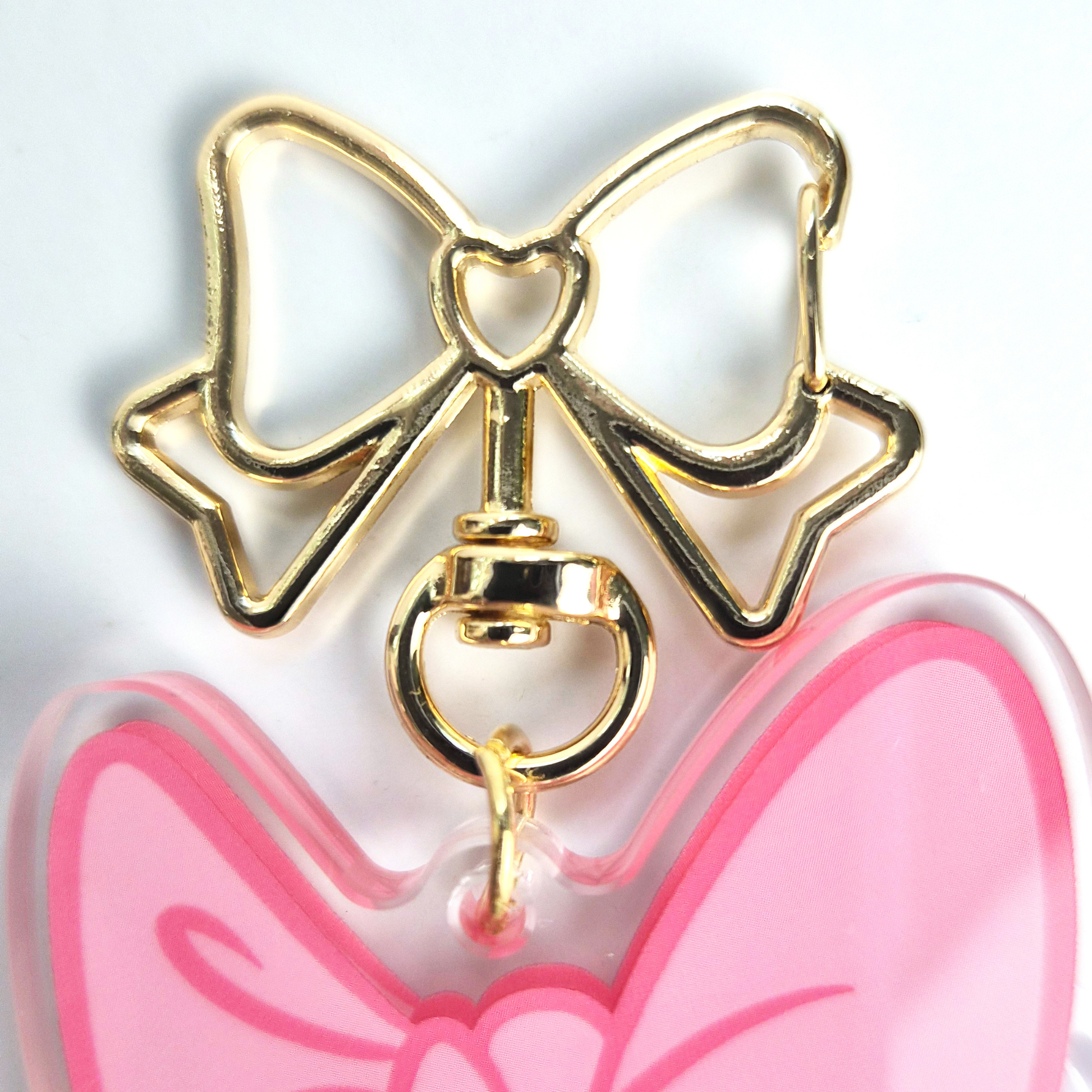 Daisy Duck keychain rose gold bow clip backlit window glow