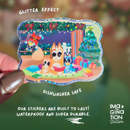 Sticker with cartoon dogs and glitter effect held by a hand, with text about durability and dishwasher safety.
