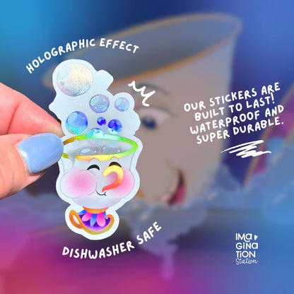 Holographic sticker held by a hand with text about durability and holographic effect.