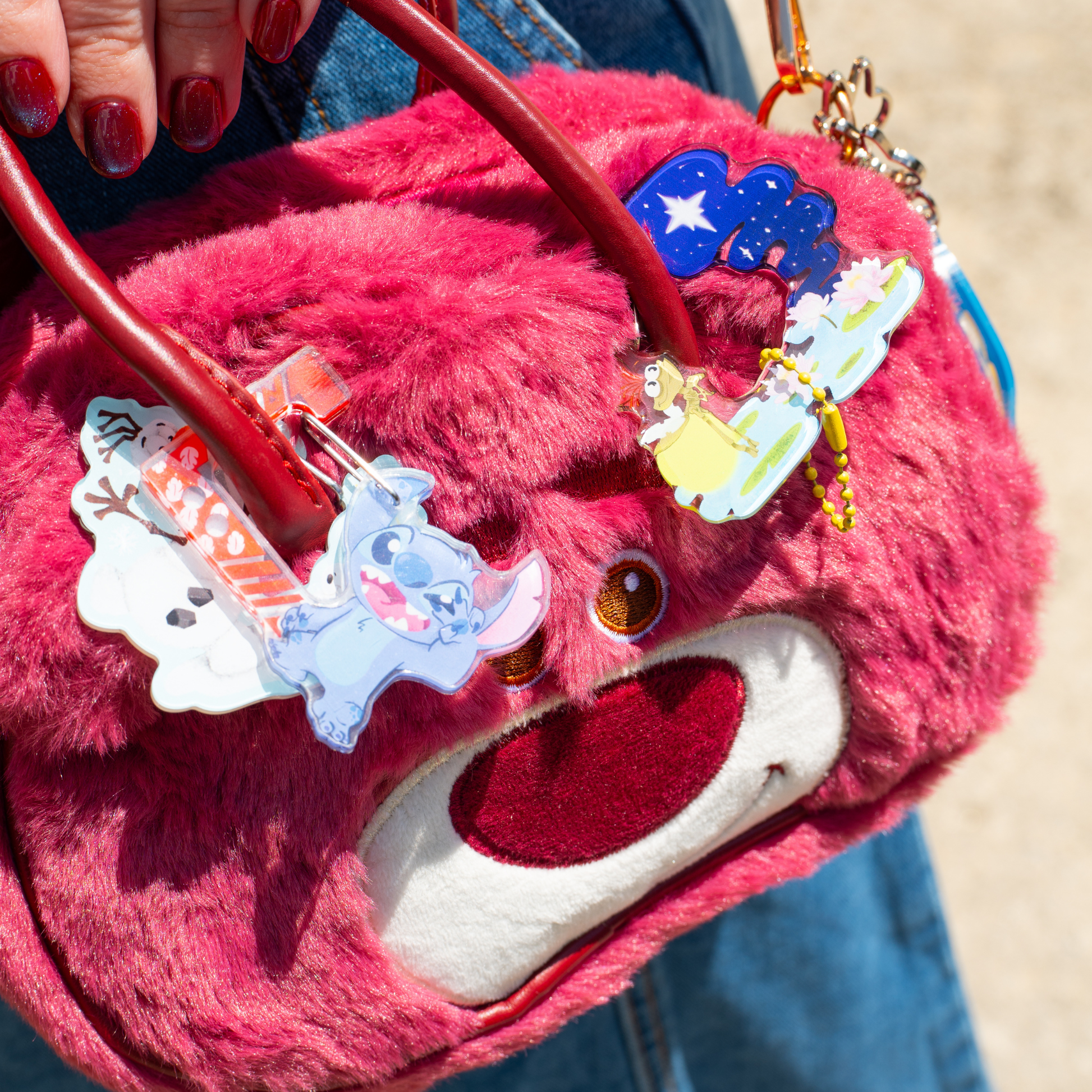 Lotso Bear crossbody bag side view – adjustable strap and secure zipper closure detail