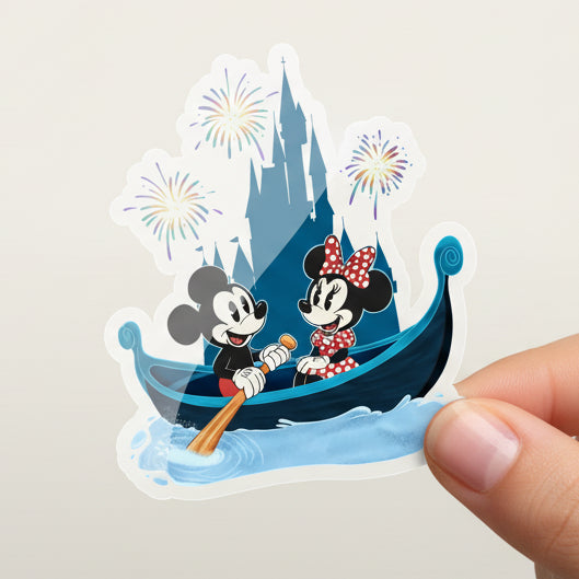 Sticker design of Mickey and Minnie Mouse in a gondola with fireworks and castle in the background, featuring 'Minnie & Mickey Sticker' and 'Imagination Station' text.