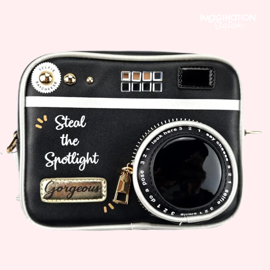 Classic camera crossbody bag front view showing vintage camera shape and gold accents