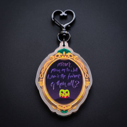 Wicked Queen mirror bag charm reflecting a hidden villain face in the mirror finish