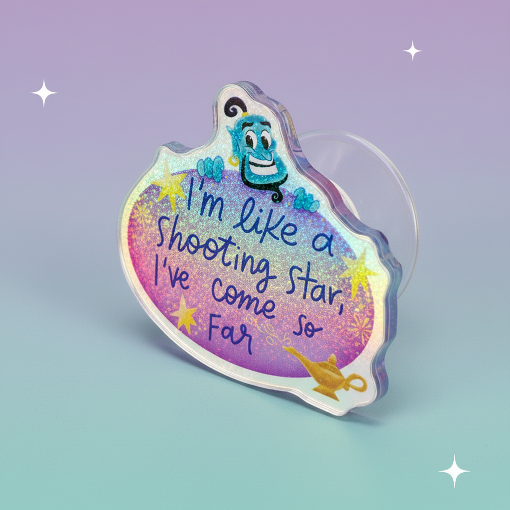 Phone holder with Aladdin Genie design on a glittery background