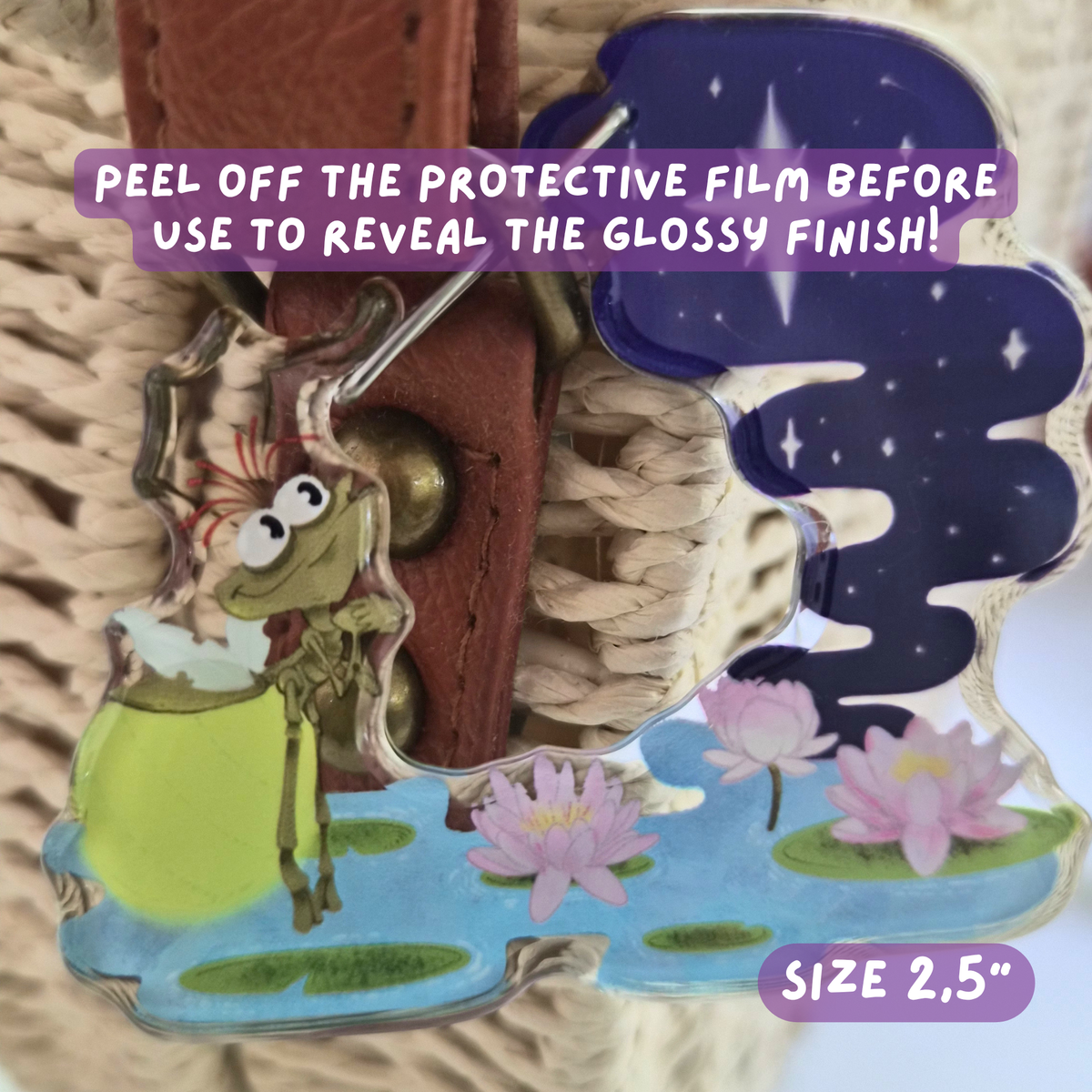 Ray and Evangeline keychain close up detail showing hand-illustrated firefly and frog design