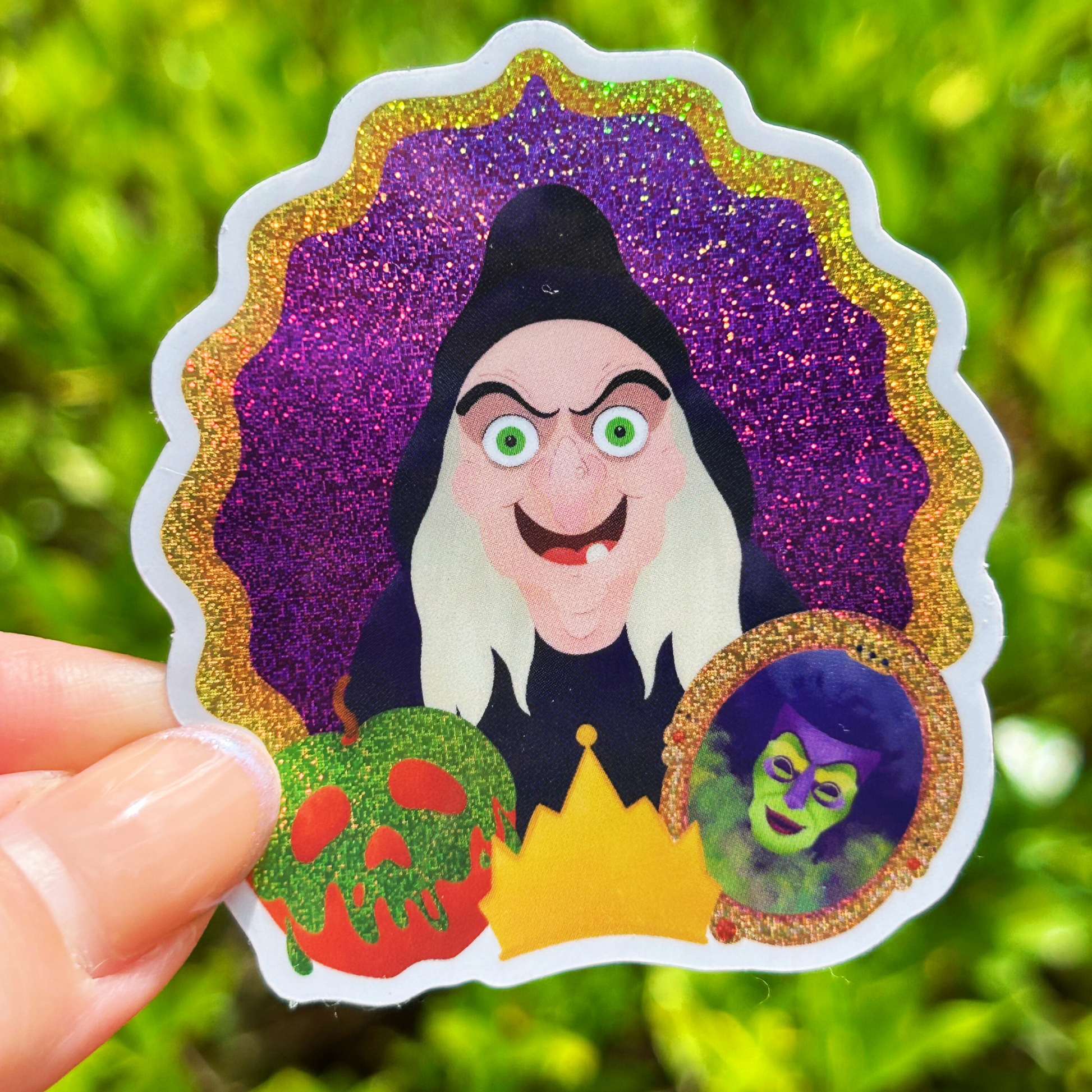 Evil Queen Snow White sticker held by hand – Queen Grimhilde pixie dust Disney villain vinyl