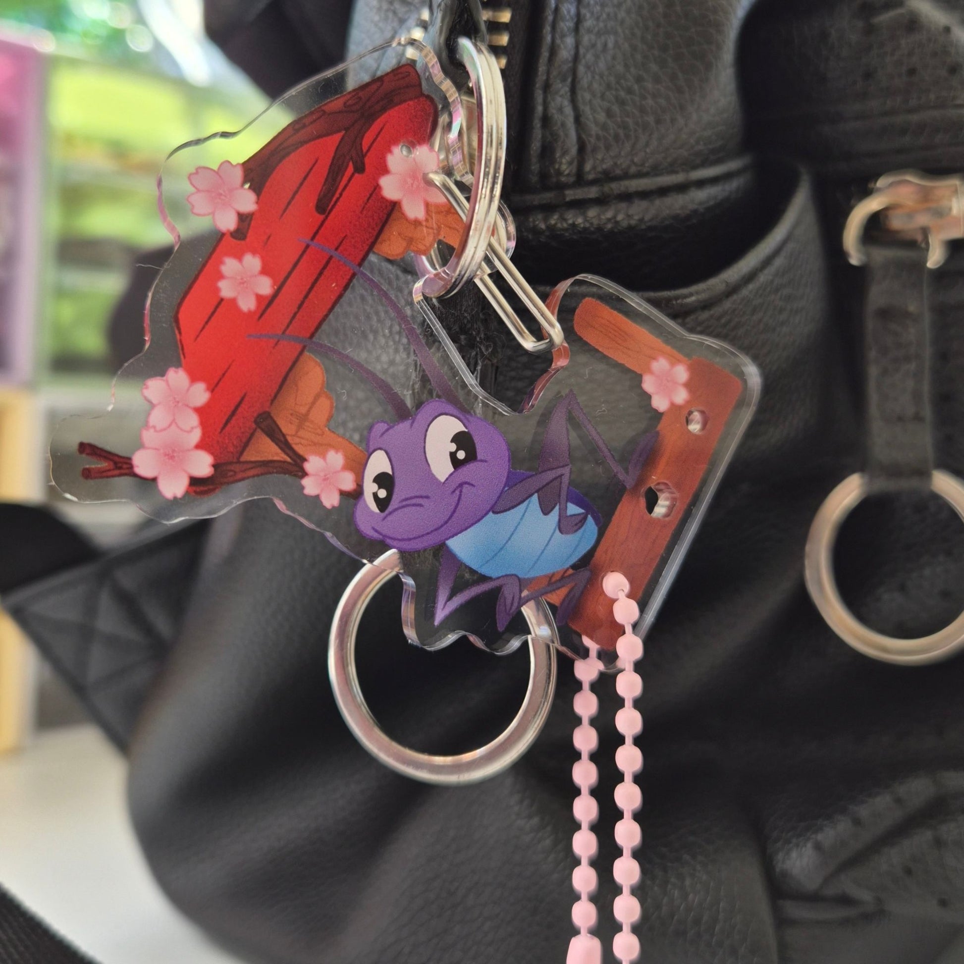 Mulan Cri-kee carabiner keychain detail – lightweight clear acrylic Disney charm clip