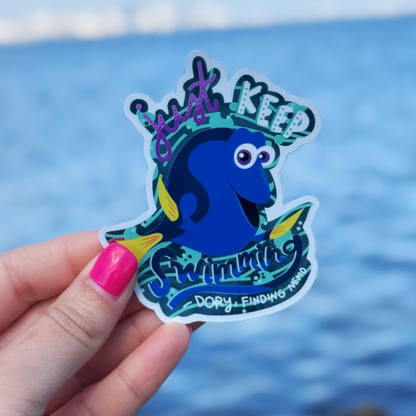 Dory Just Keep Swimming sticker held by hand – 2.5 x 3.2 inch mirror effect waterproof vinyl