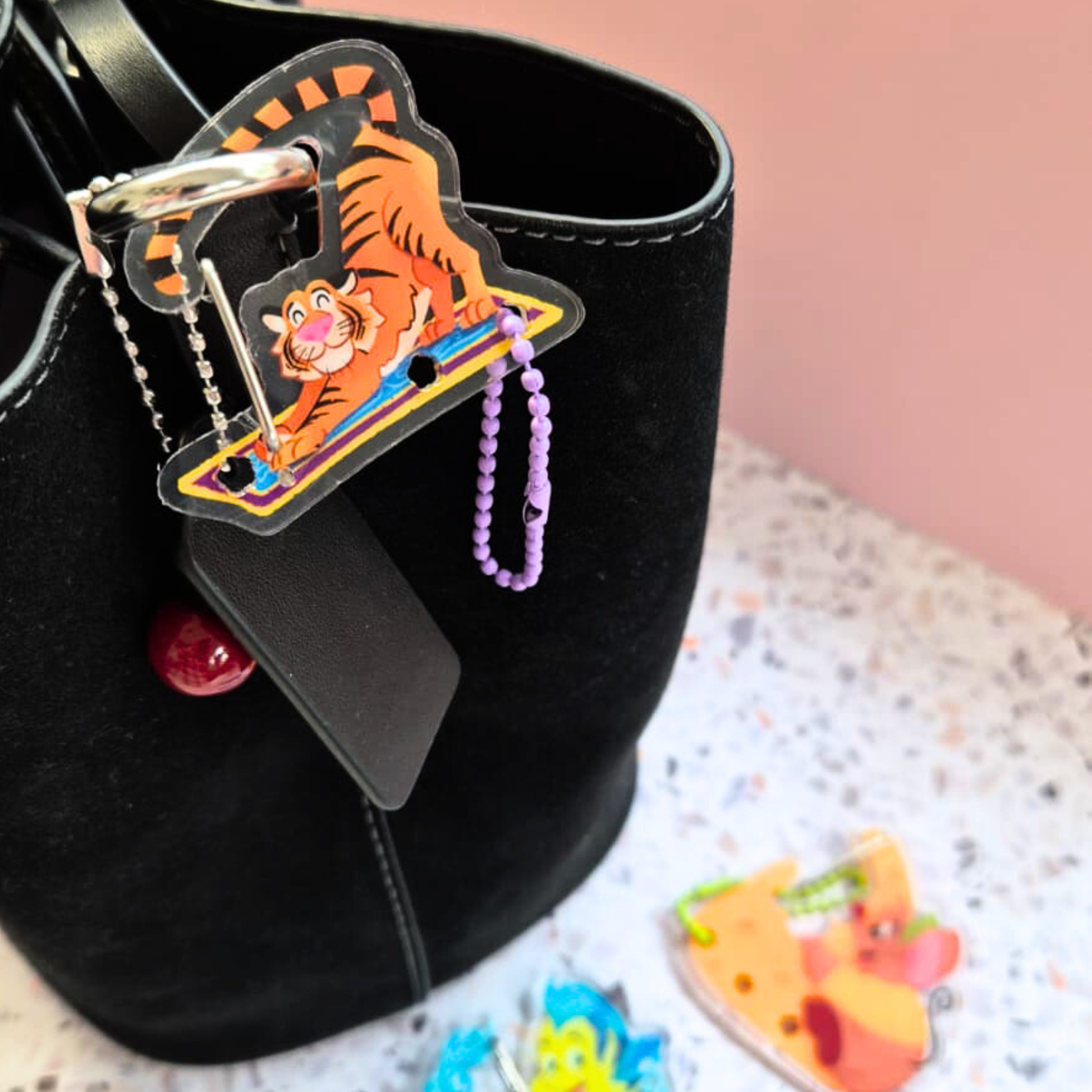 Rajah Aladdin carabiner detail – vibrant full-color tiger acrylic Disney clip