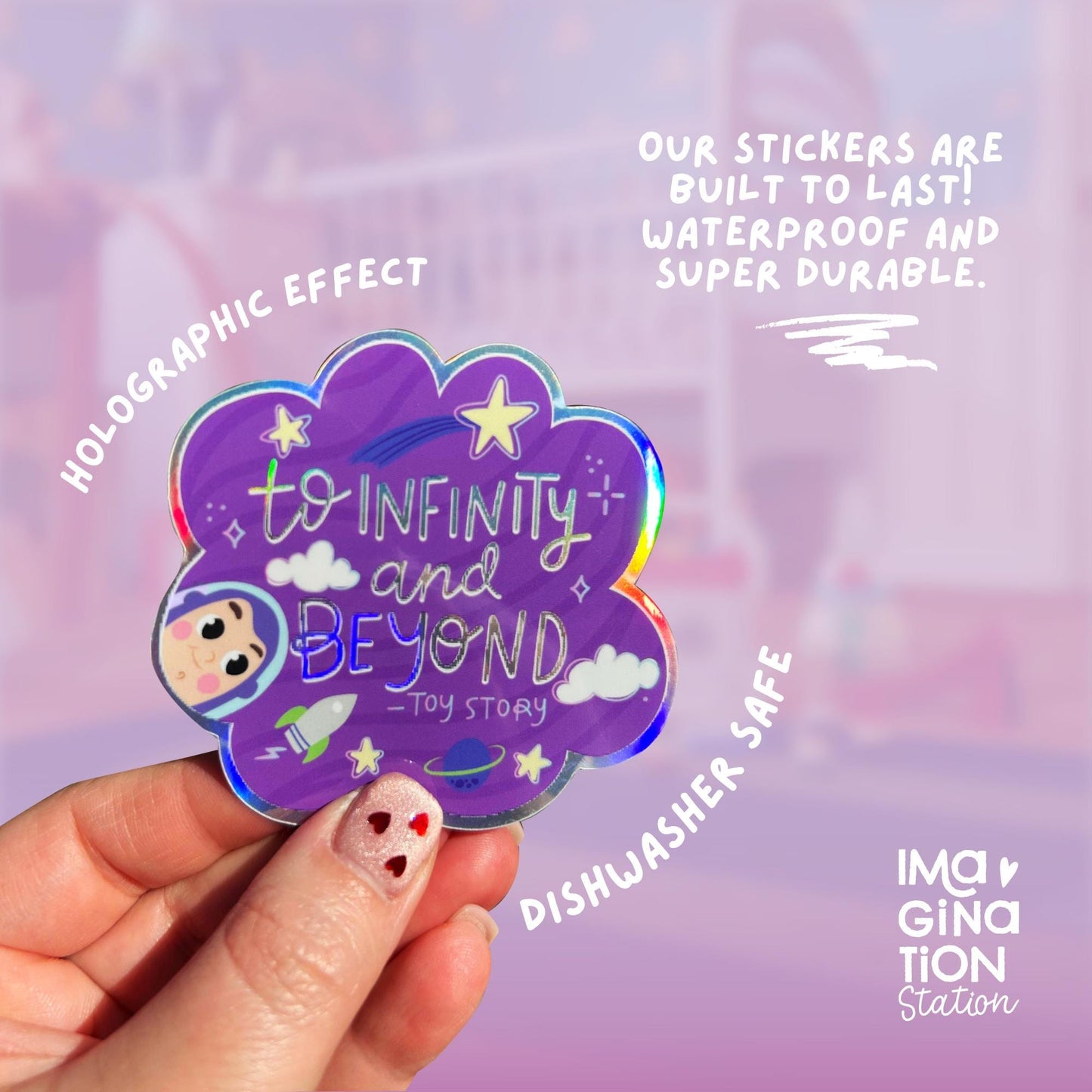 Holographic 'To Infinity and Beyond' sticker held by a hand with a purple background
