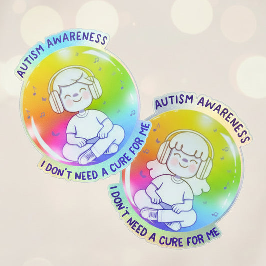 Autism awareness stickers with colorful design and text on a blurred background