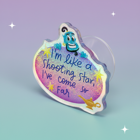 Phone holder with Aladdin Genie design on a glittery background