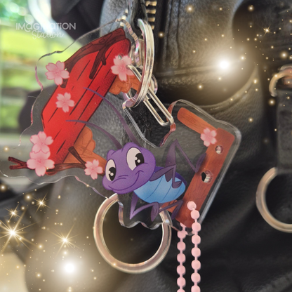 Mulan Cri-kee carabiner keychain front view – clear glossy acrylic lucky cricket Disney charm