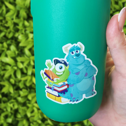 Green tumbler with cartoon characters on a green leafy background