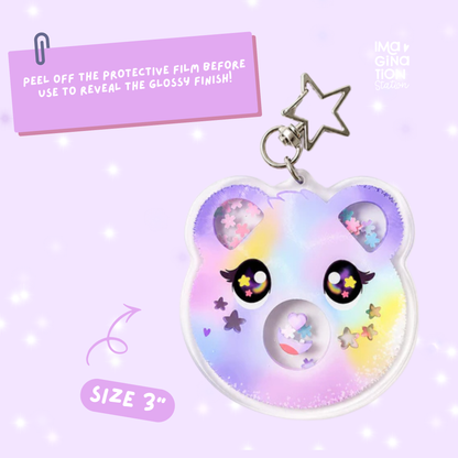 Care Bears sequin shaker bag charm collection flat lay showing all six colors