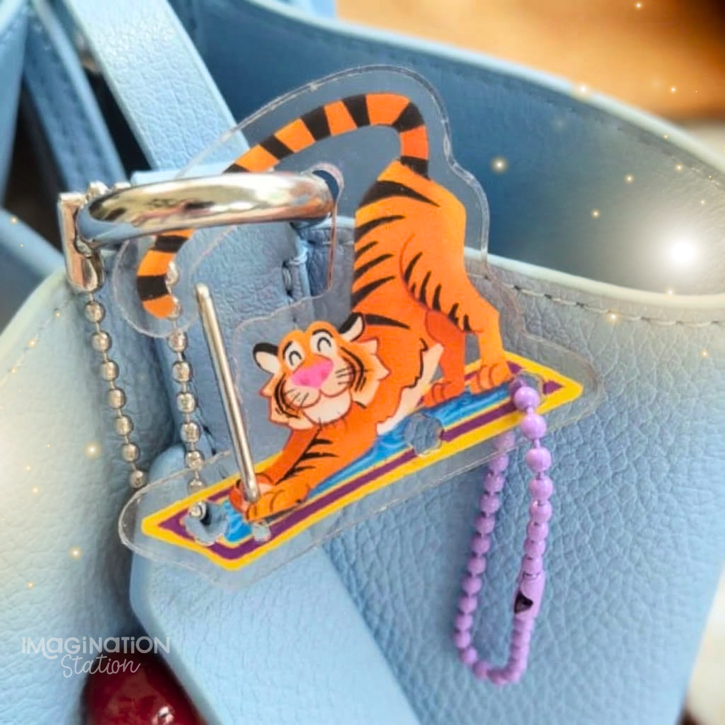 Rajah Aladdin Jasmine carabiner keychain front view – clear acrylic Disney tiger charm clip