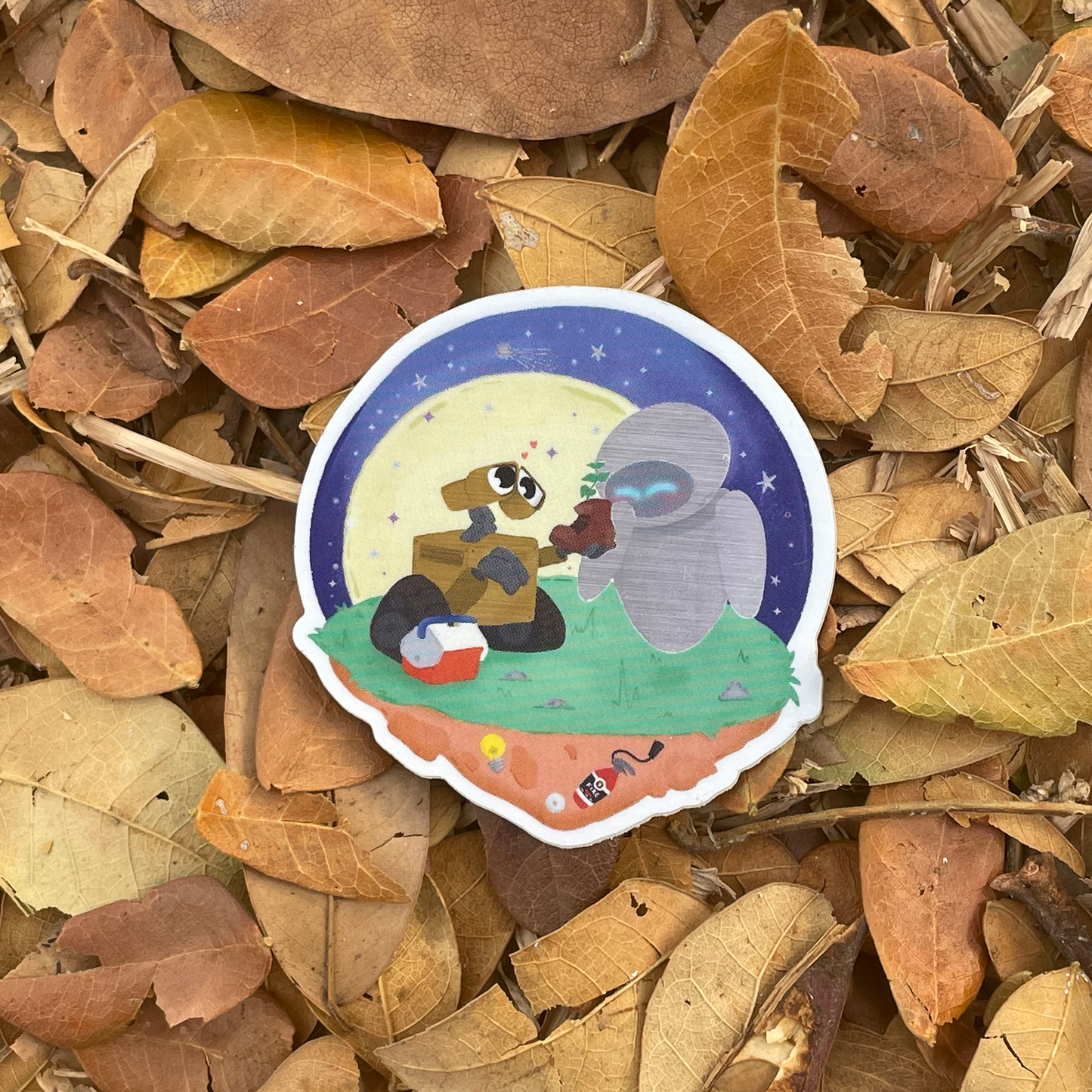 WALL-E and EVE sticker held by hand – brushed aluminium matte waterproof Disney Pixar vinyl